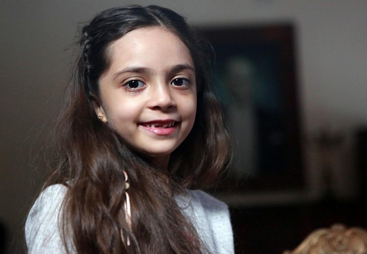 Syrian girl Bana al-Abed, known as Aleppo's tweeting girl, poses during an interview in Ankara, Turkey, on December 22, 2016
