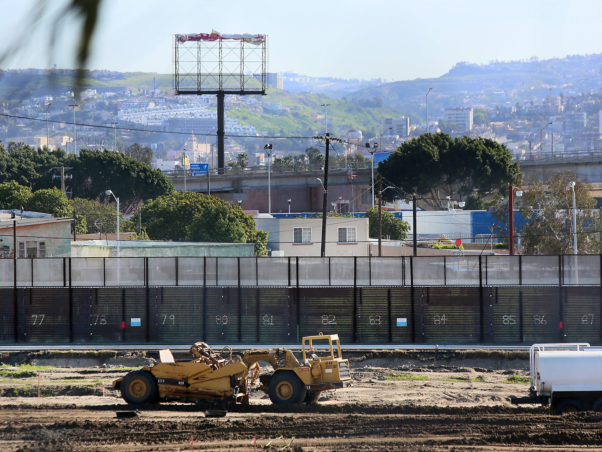 Construction along the US-Mexico border wall in San Ysidro, California. US President Donald Trump issued an executive order to begin the process of building a wall along the US-Mexico border and is expected to sign an executive order that would suspend the United States' broader refugee program for 125 days