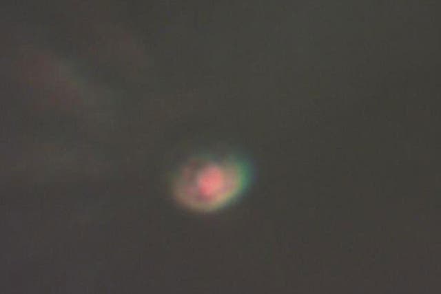 Metallic hydrogen should look like incredibly shiny silver, but it appears red when seen through one of the diamonds holding it under astonishing pressure