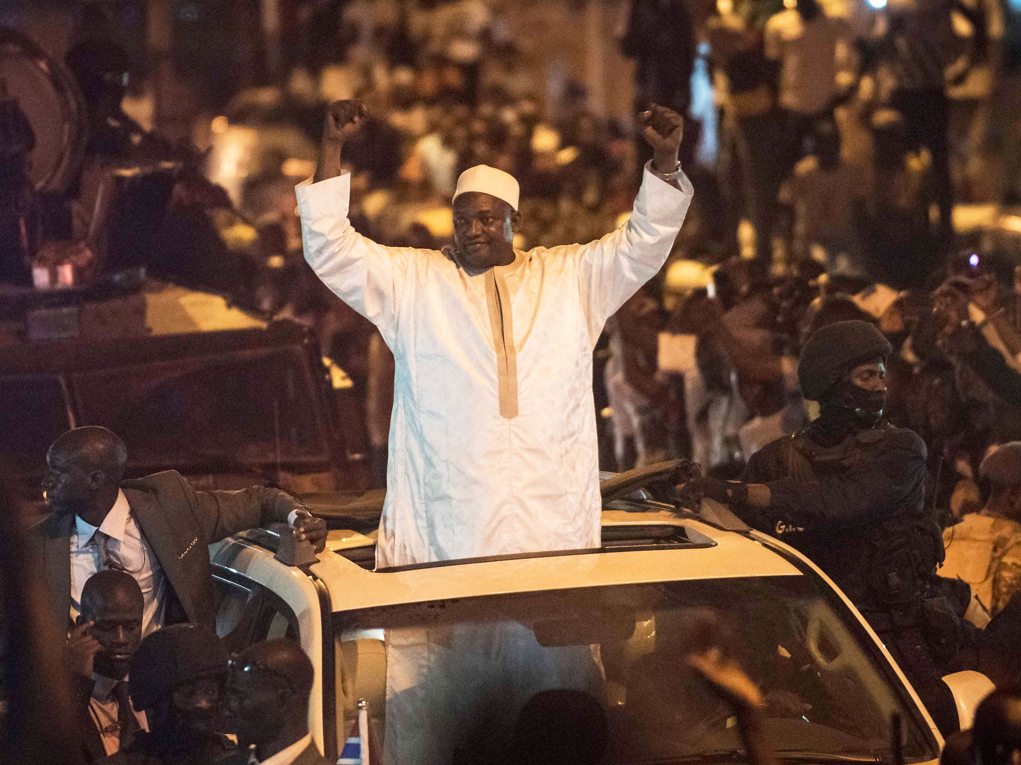 The Gambia s President Adama Barrow returns home almost two months