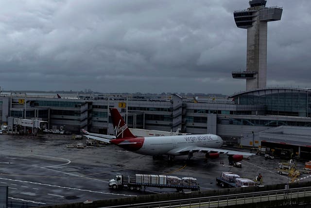 Flights between London and New York (pictured, JFK airport) could resume in time for Thanksgiving
