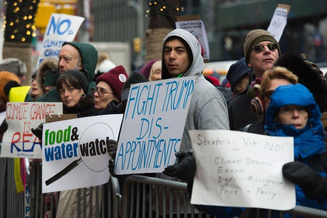 Climate activists rally, to urge politicians to stand against climate denial and hate, January 9, 2017 in New York