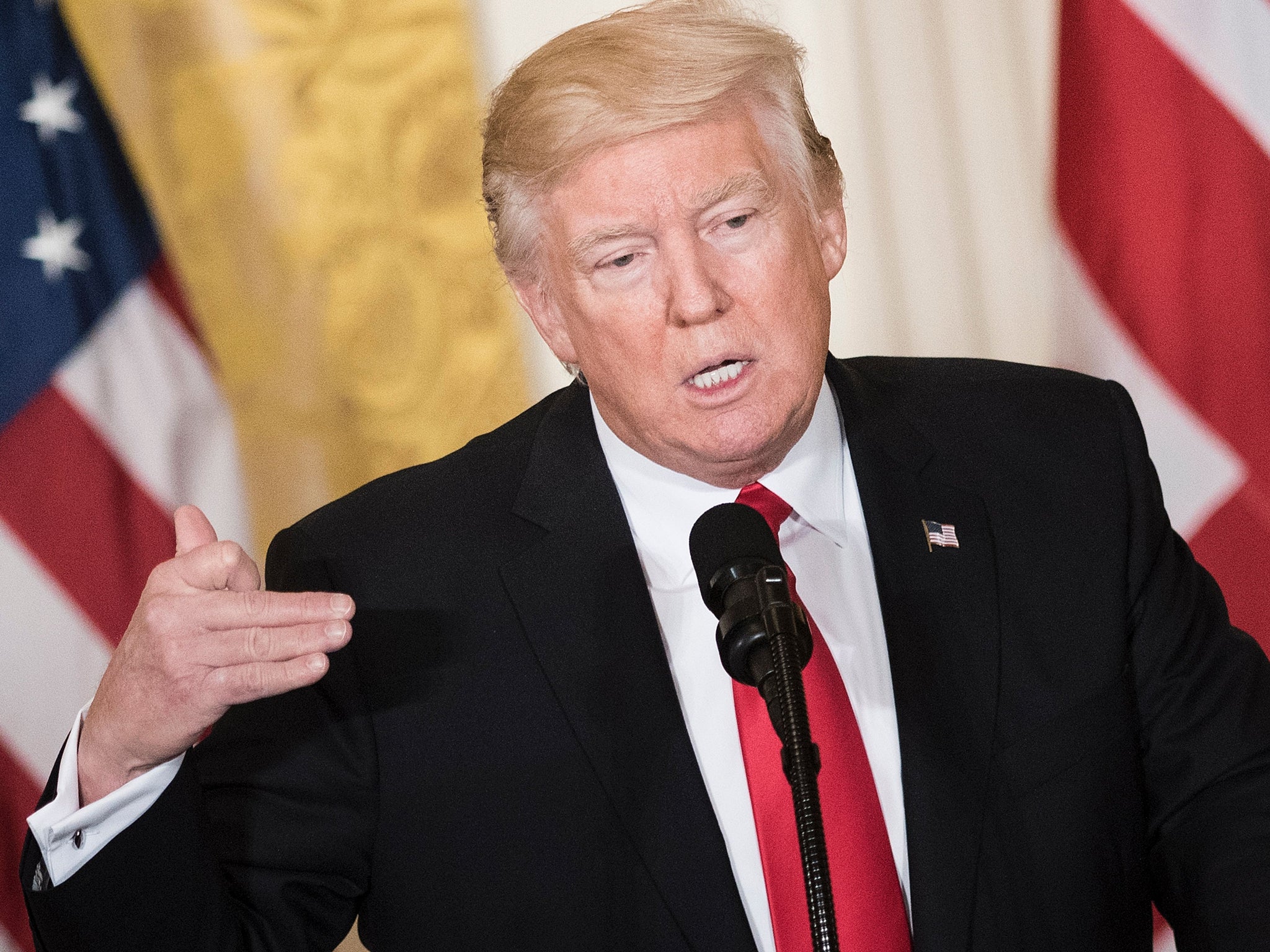 Donald Trump speaks during a press conference with UK prime minister Theresa May