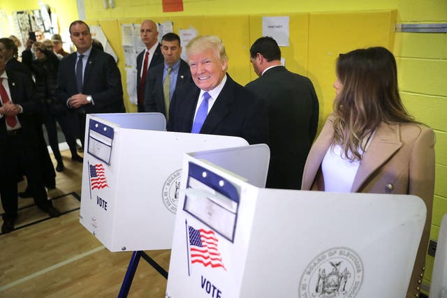 <p>Republican presidential nominee Donald Trump and his wife Melania Trump cast their votes on Election Day at PS 59 November 8, 2016 in New York City</p>