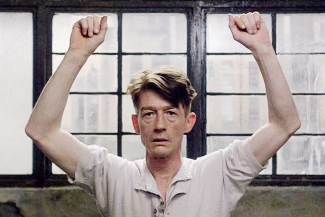The late Sir John Hurt playing Winston Smith in Michael Radford's 1984 film adaptation of Orwell's novel