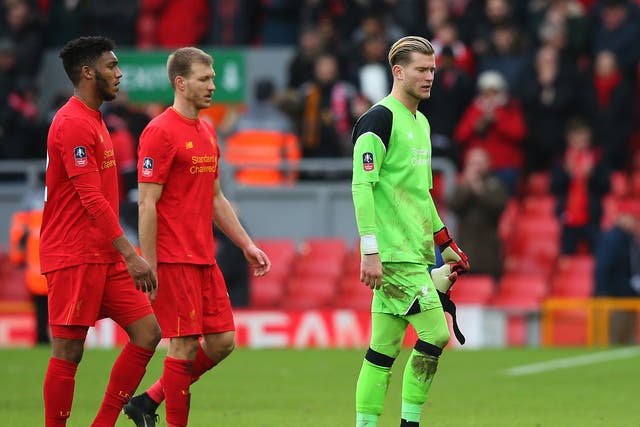 Liverpool's players trudge off the pitch after their shock defeat to Wolves