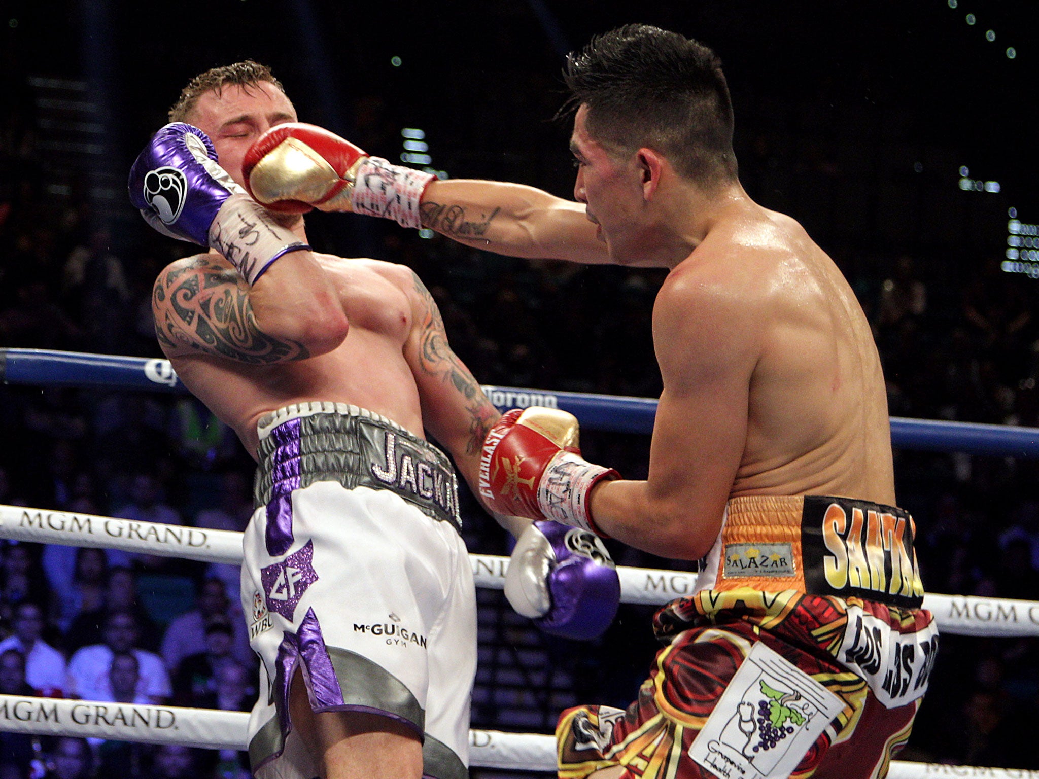 Santa Cruz catches Frampton in the face en route to a dancing victory