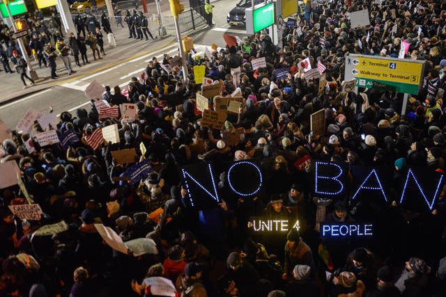 Protests outside Terminal 4 at JFK airport where two Iraqis were detained despite holding valid visas