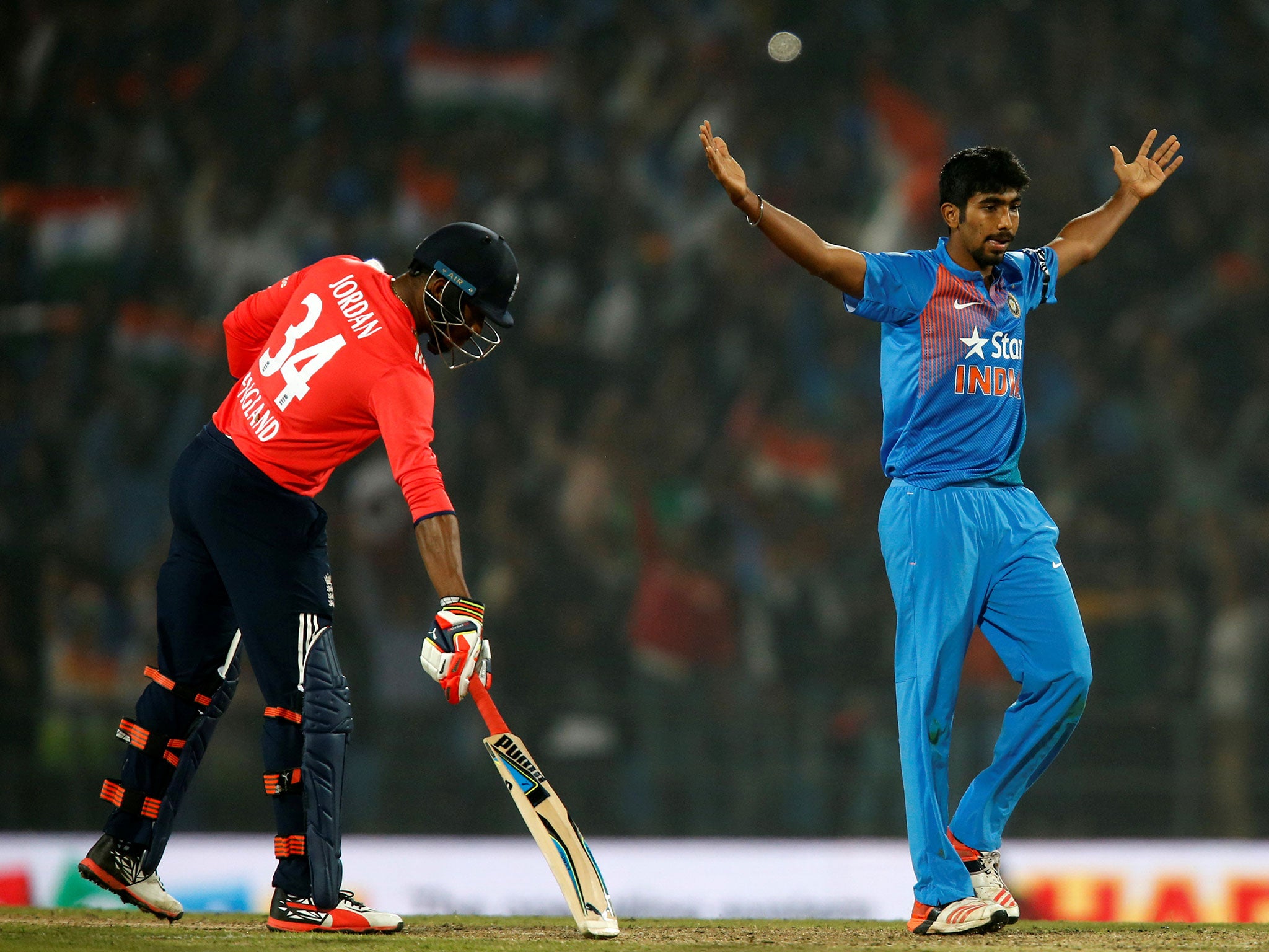 India's Jasprit Bumrah celebrates after winning the match