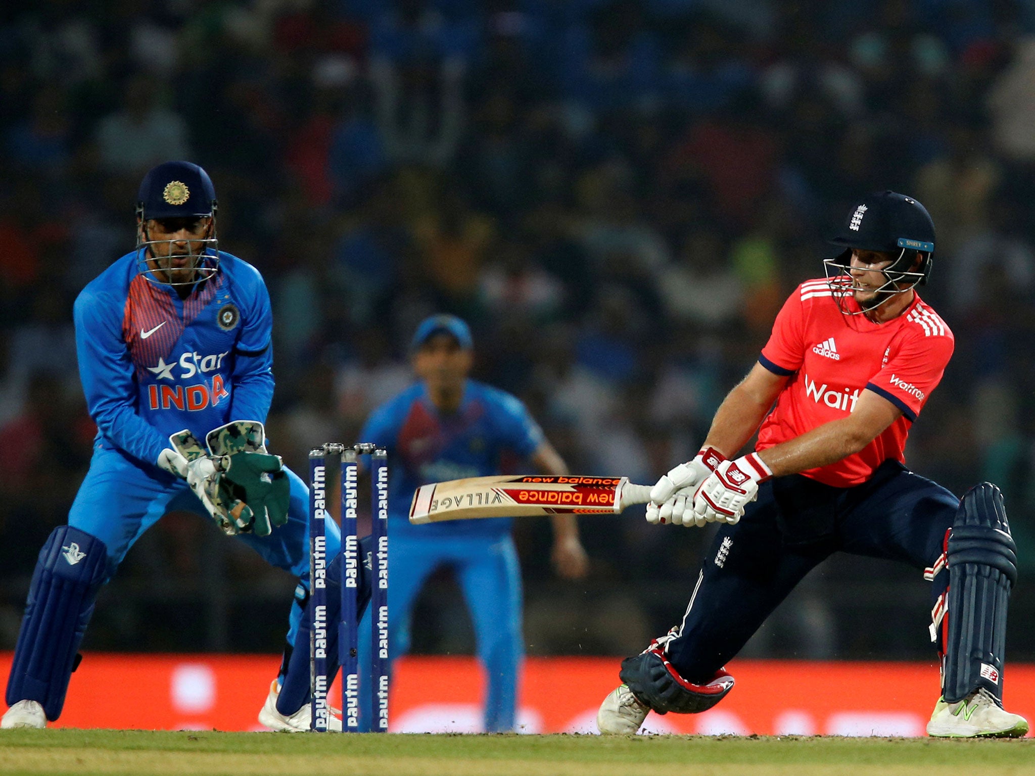 Root in action for England