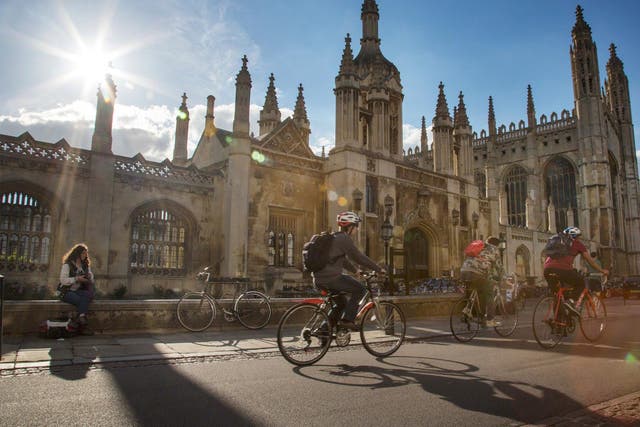 Students at Cambridge have been advised not to wear academic gowns at several points in history, following century-old divisions between 'town and gown'