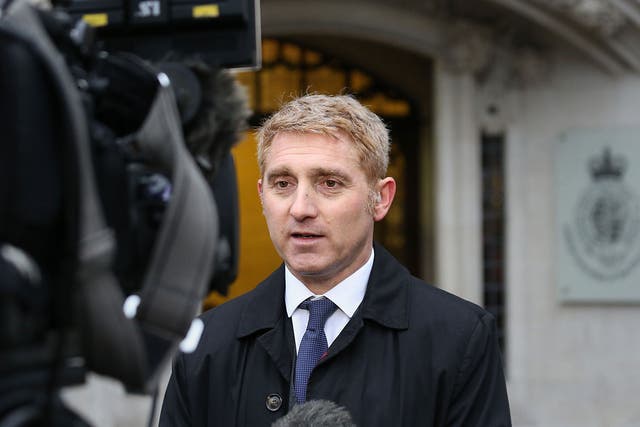 Jon Platt, who successfully challenged a conviction for taking his daughter on an unauthorised holiday during school term time, speaks to the media outside the Supreme Court in central London, where the Isle of Wight Council is appealing over the case