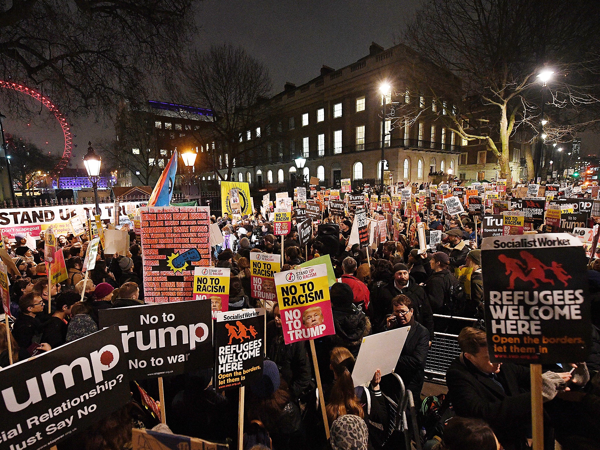 Stand Up To Racism, which also helped organise Monday's London march (pictured), is protesting Theresa May's state invite to Mr Trump