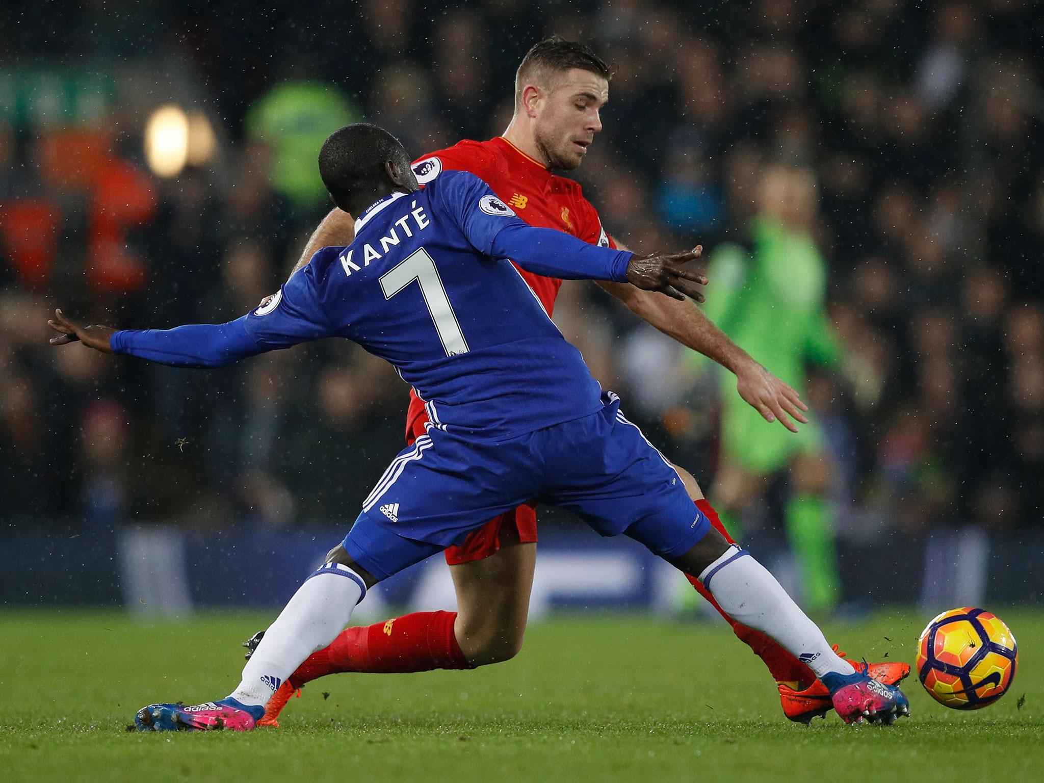 N'Golo Kante reaches to dispossess Jordan Henderson (Getty)