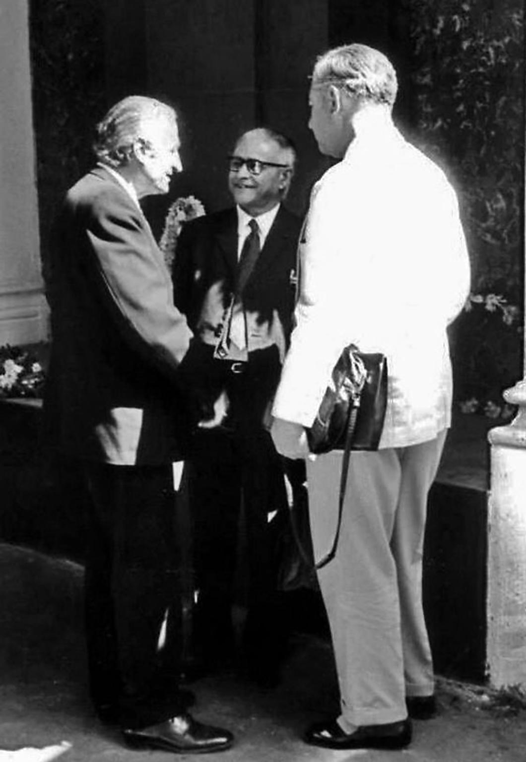 Talwar, centre, is reacquainted with German agent Dietrich Witzel, right, in Calcutta in 1966