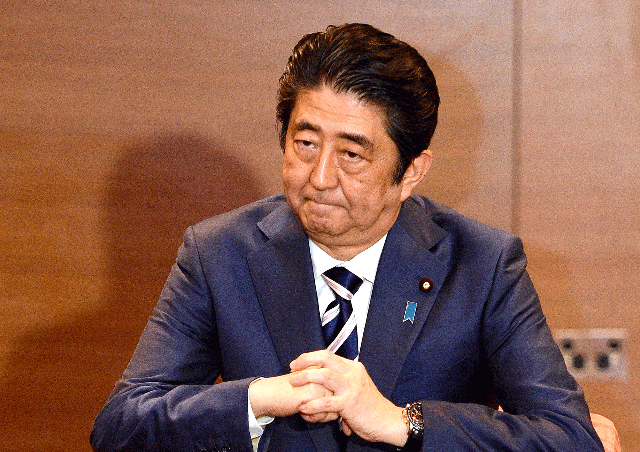 Japanese Prime Minister Shinzo Abe - Japan's Ministry of Justice, which oversees immigration, this week announced new rules governing permanent residency