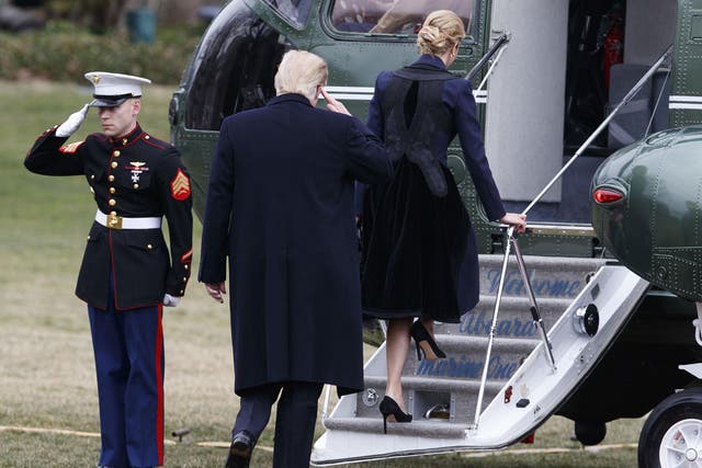 President Donald Trump follows his daughter Ivanka to board Marine One on the South Lawn of the White House