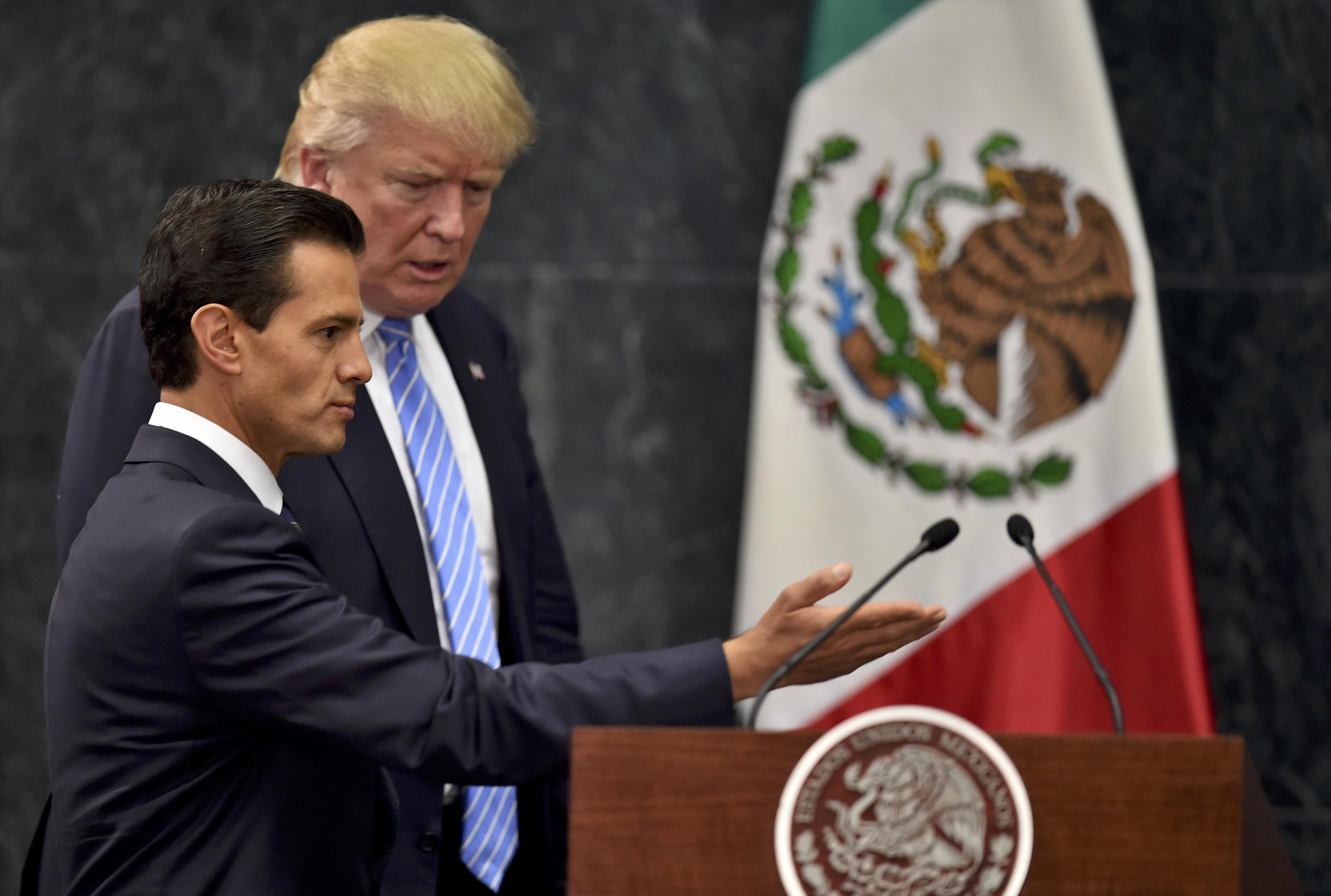 Donald Trump (R) and Mexican President Enrique Pena Nieto delivered a joint press conference in Mexico City before the election
