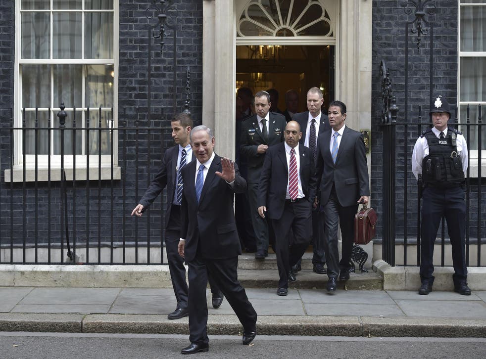 Israeli Prime Minister Benjamin Netanyahu leaves 10 Downing Street after a meeting with British Prime Minister David Cameron in 2015