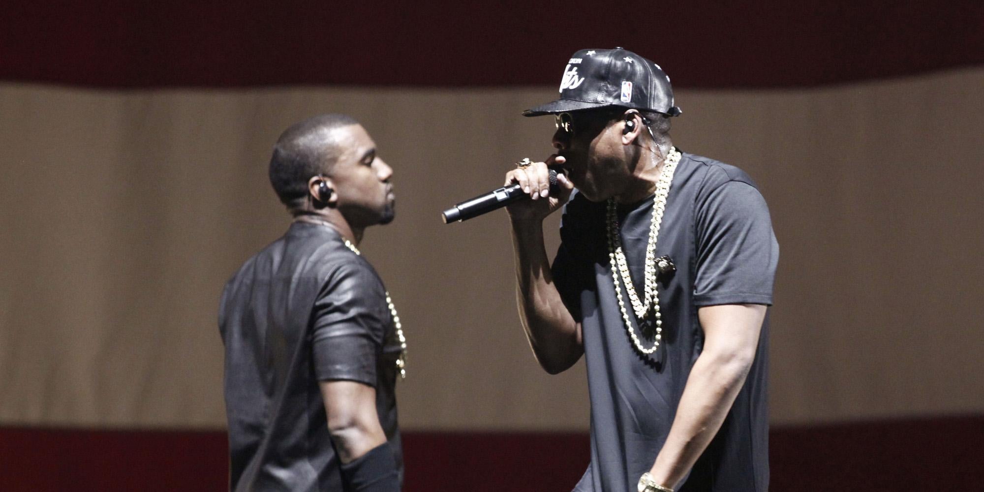 Jay-Z (right) raps about his friendship with Kanye West (left) on his new album (AFP/Getty)