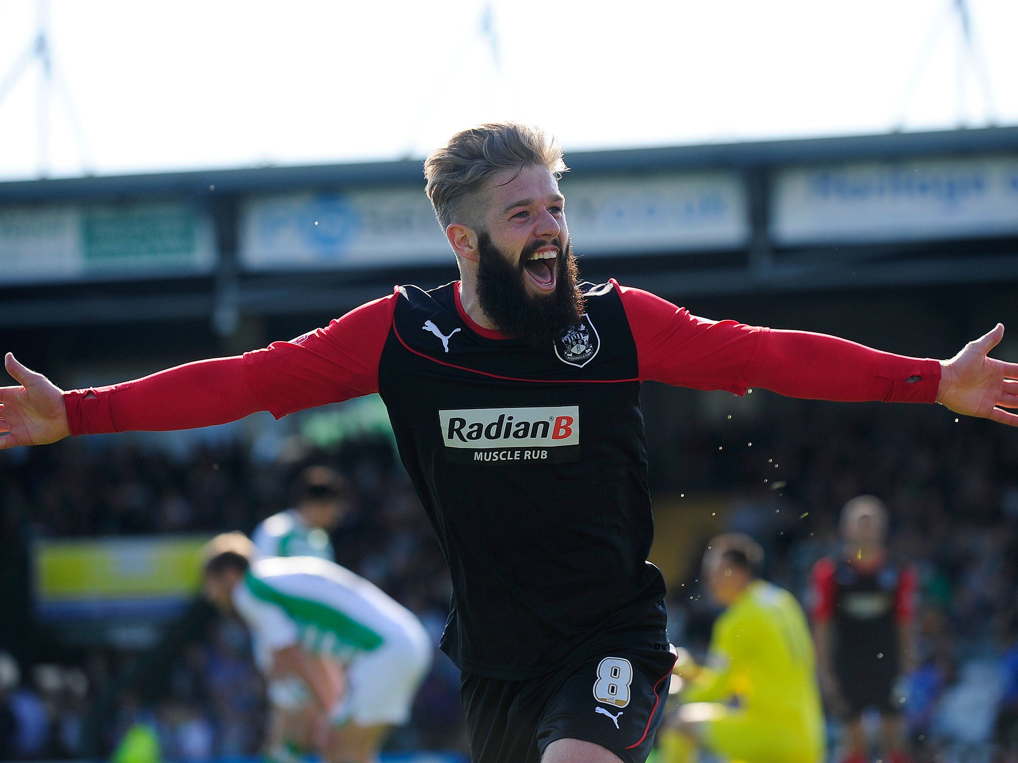 Clayton will be known to many for his lengthy beard during his Huddersfield days