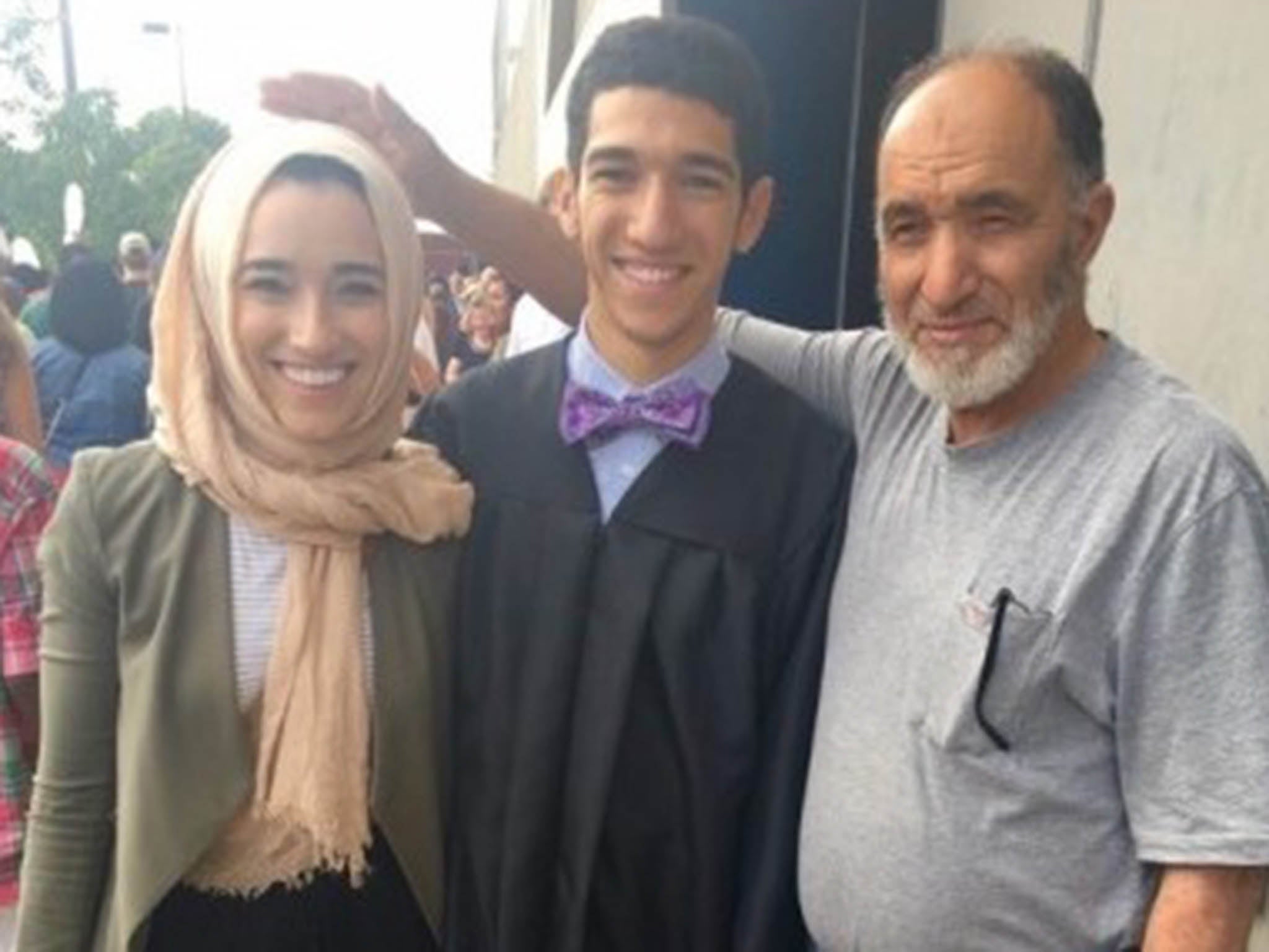 From left, Malak El-Amri, her brother, Mohamed, and father, Abubaker Amri