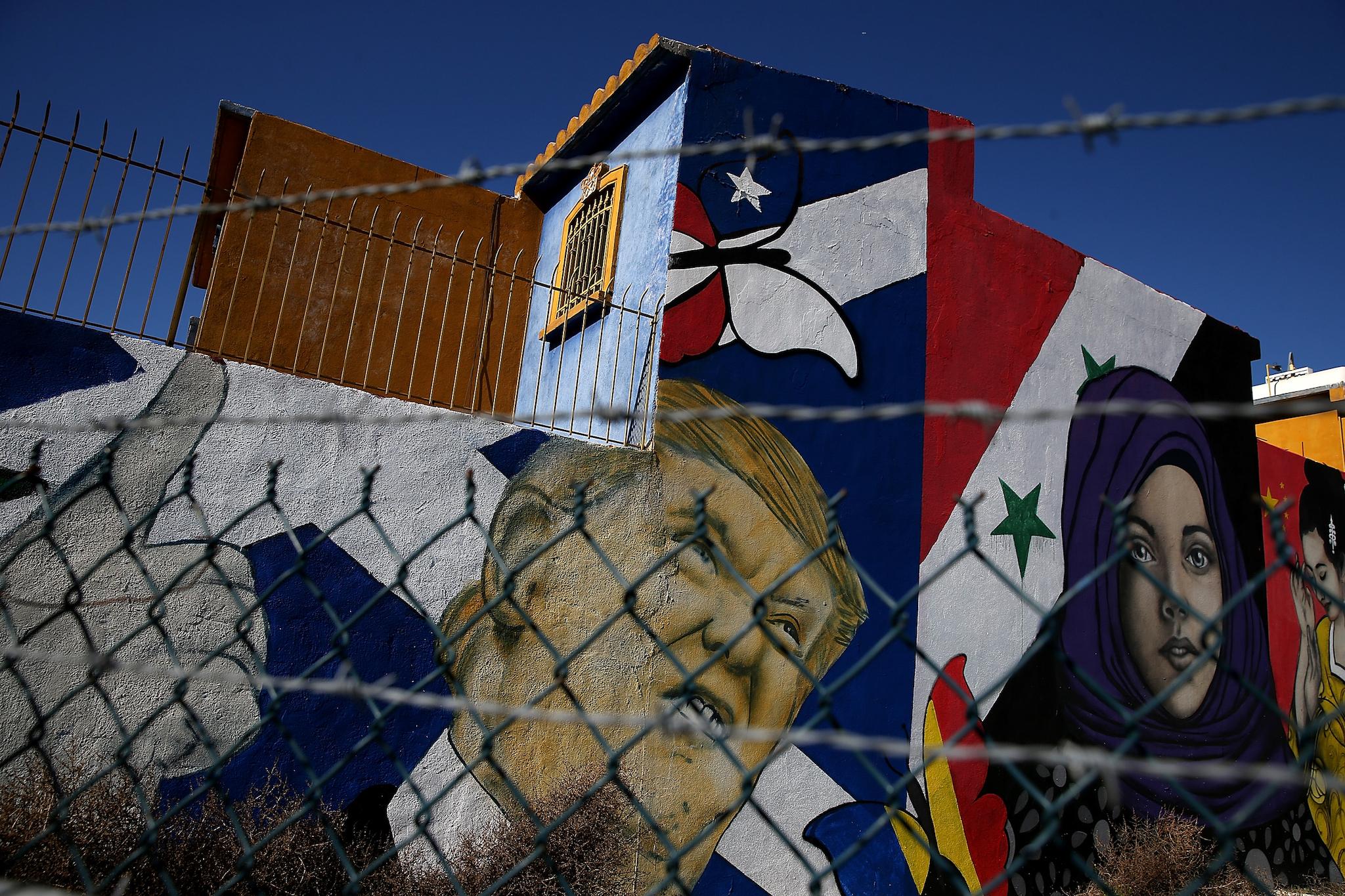 A mural of U.S. President Donald Trump is displayed on the side of a home on January 27, 2017 in Tijuana, Mexico