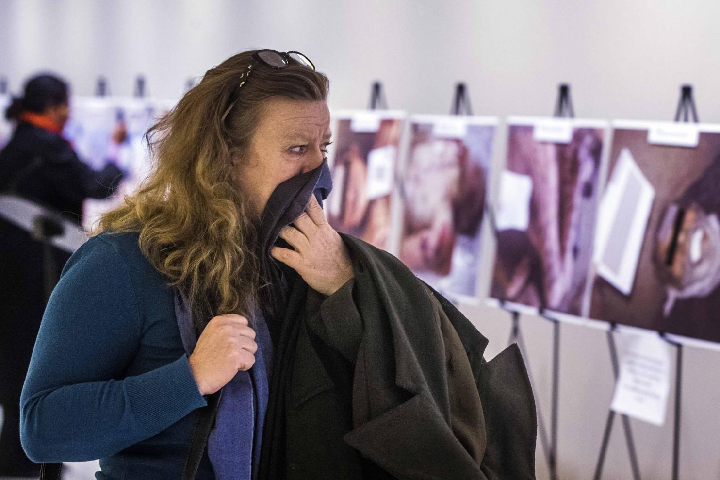 Images of torture victims and dead bodies on display at the UN in New York