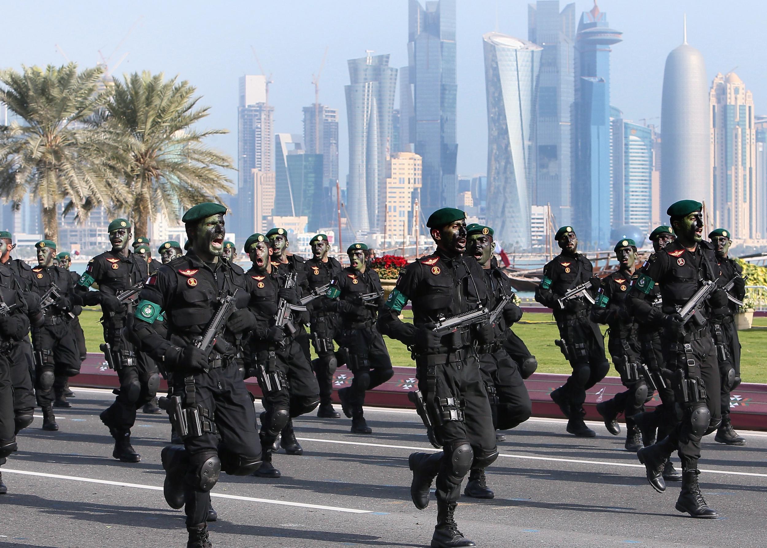 Qatari army special forces take part in a military parade