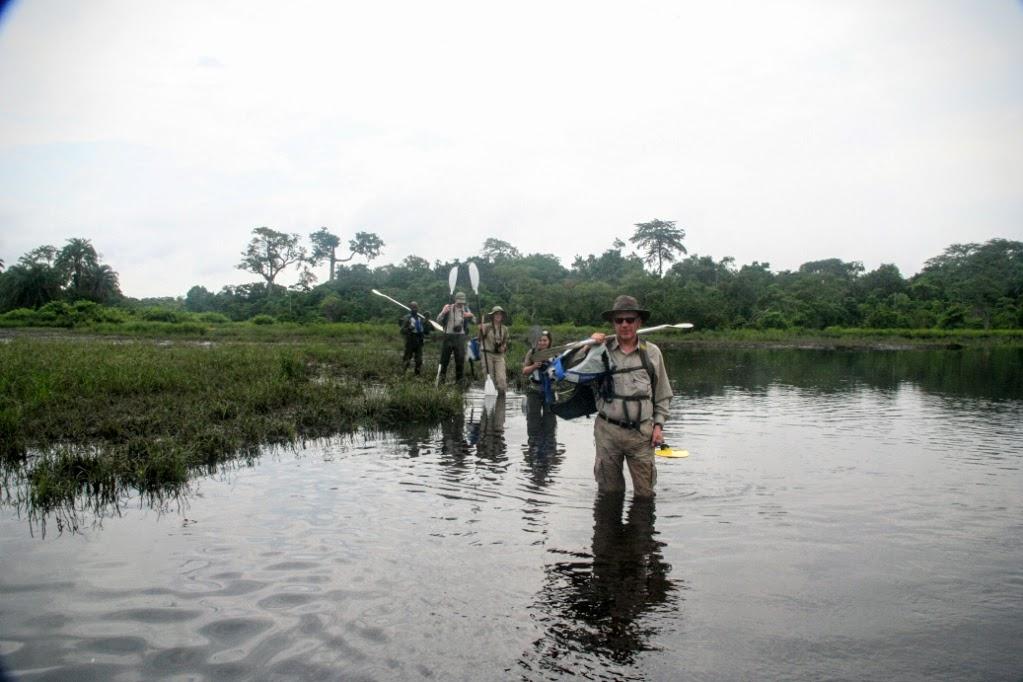 Nick's group prepares to trek through the river to Lango Camp