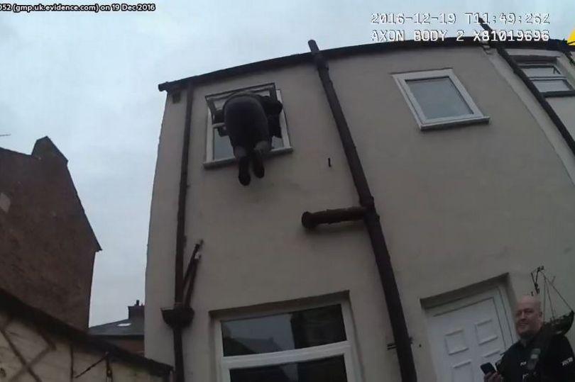 The homeowner returned to find a man dangling from her bathroom window