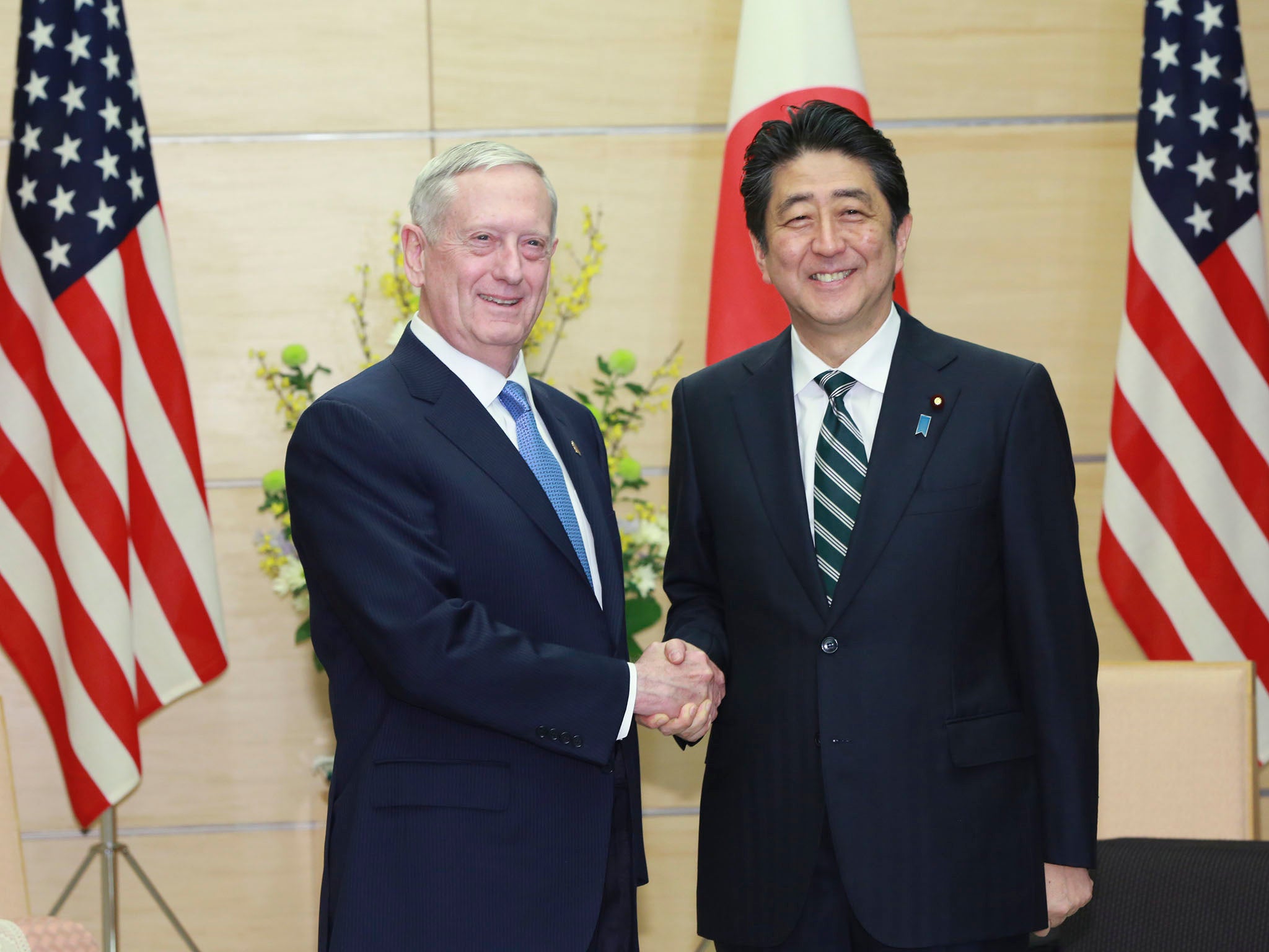 US Defence Secretary James Mattis, left, with Japanese Prime Minister Shinzo Abe