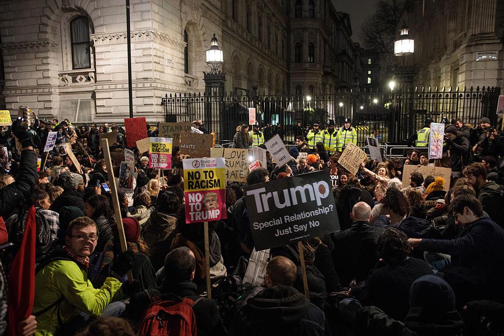 Demonstrators outside Downing Street protest President Trump’s ban on travel from seven Muslim countries (Getty)