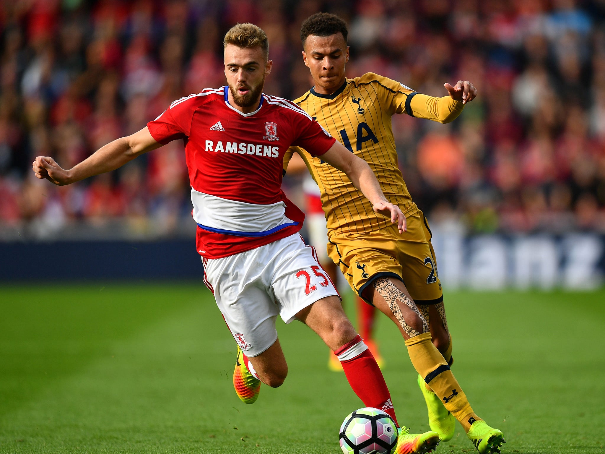 Calum Chambers and Dele Alli challenge for the ball in this season's earlier fixture