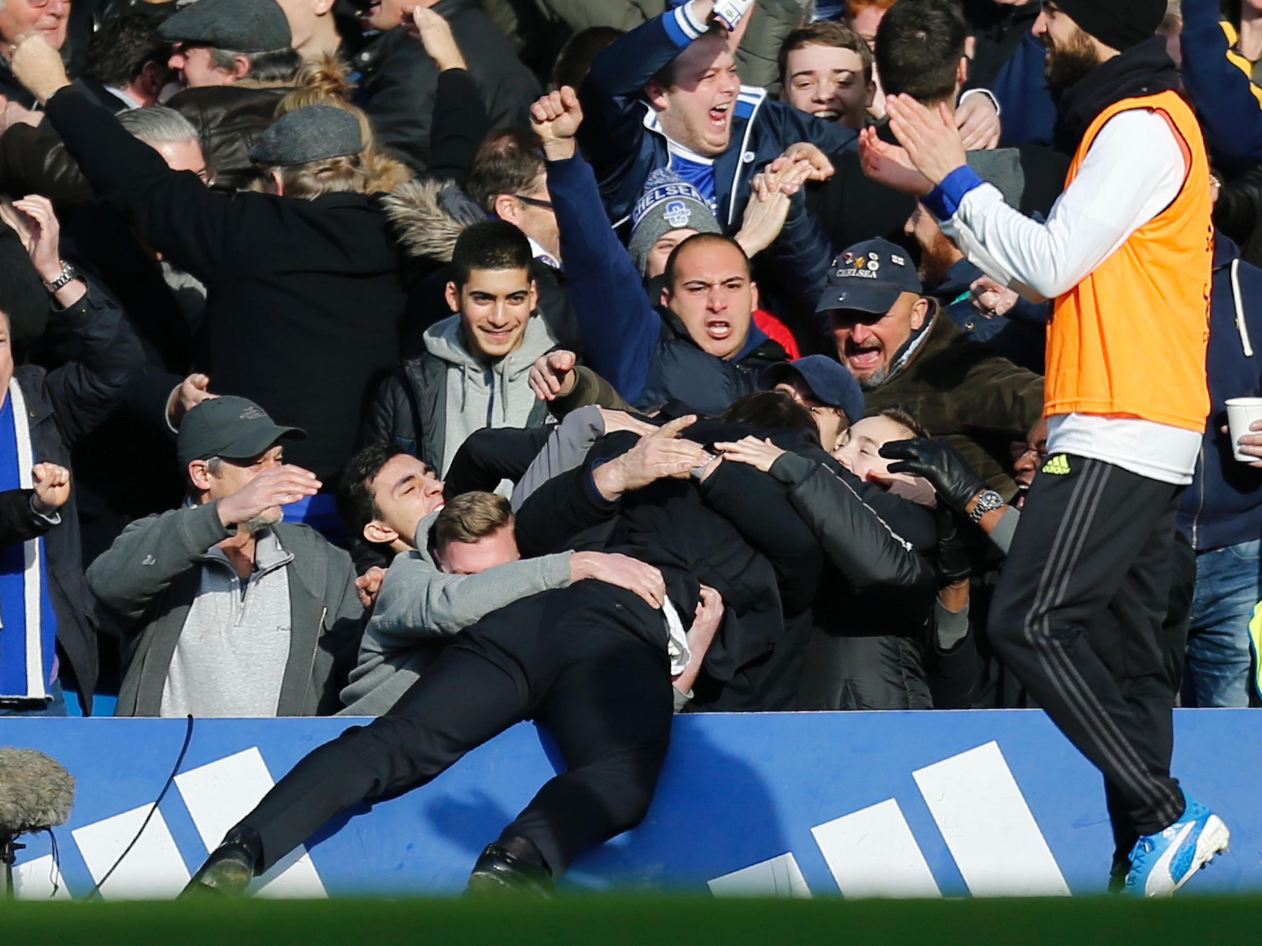 Conte dived into the crowd after Hazard doubled the Blues' lead