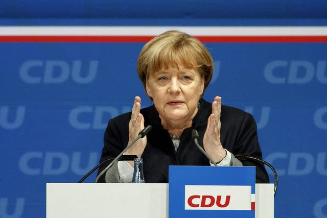 Angela Merkel speaks at the regional party conference of the CDU Schleswig-Holstein in Neumuenster