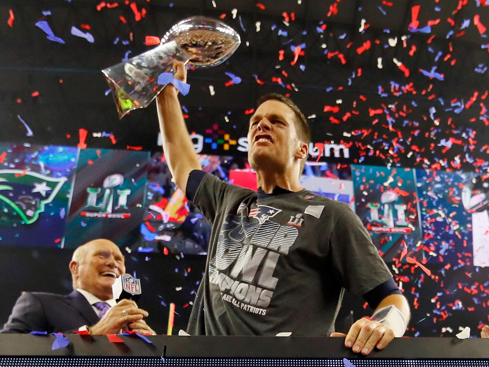 Tom Brady lifts the Lombardi Trophy after the New England Patriots won the Super Bowl by defeating Atlanta Falcons