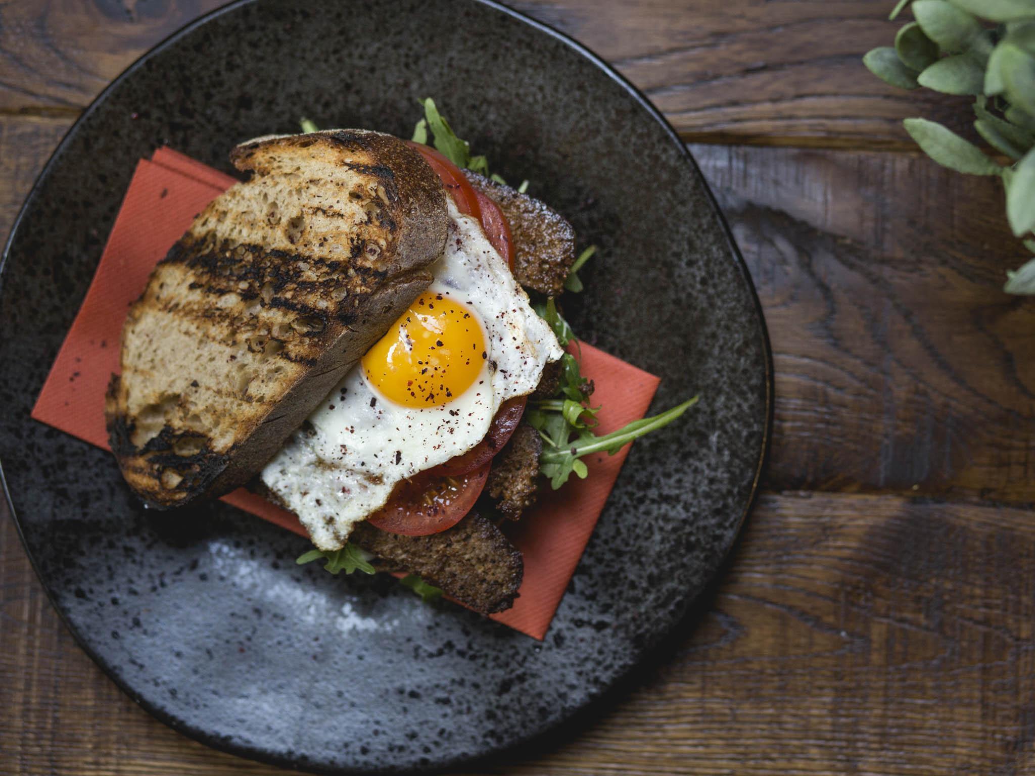 &#13;
Crispy sujuk on sourdough with dill, mayo, tomato and fried egg&#13;