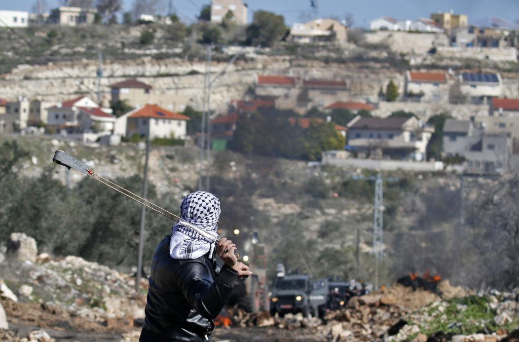 Israeli MKs narrowly voted to legalise settlements built on Palestinian land