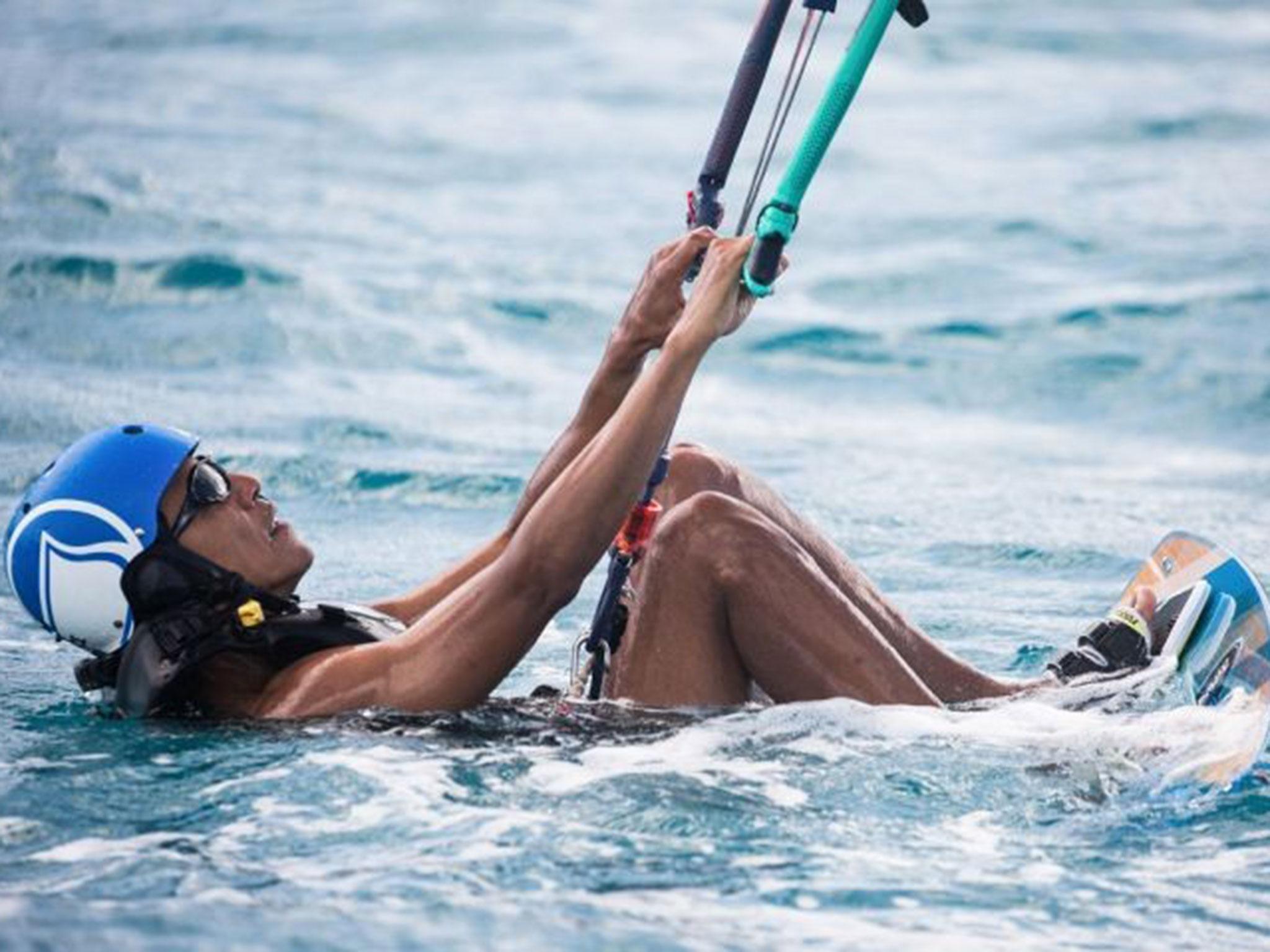Mr Obama prepares to kite surf