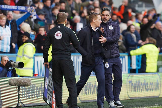 Leeds United Manager Garry Monk and Huddersfield Town Manager David Wagner clash before both being sent to the stands