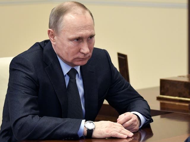 Russian President Vladimir Putin attends a meeting outside Moscow on 7 Febuary
