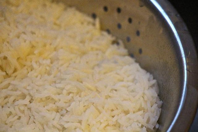Scientists warn that the usual method of cooking rice — simply boiling it in a pan with some water — can expose those who eat it to traces of the poison arsenic