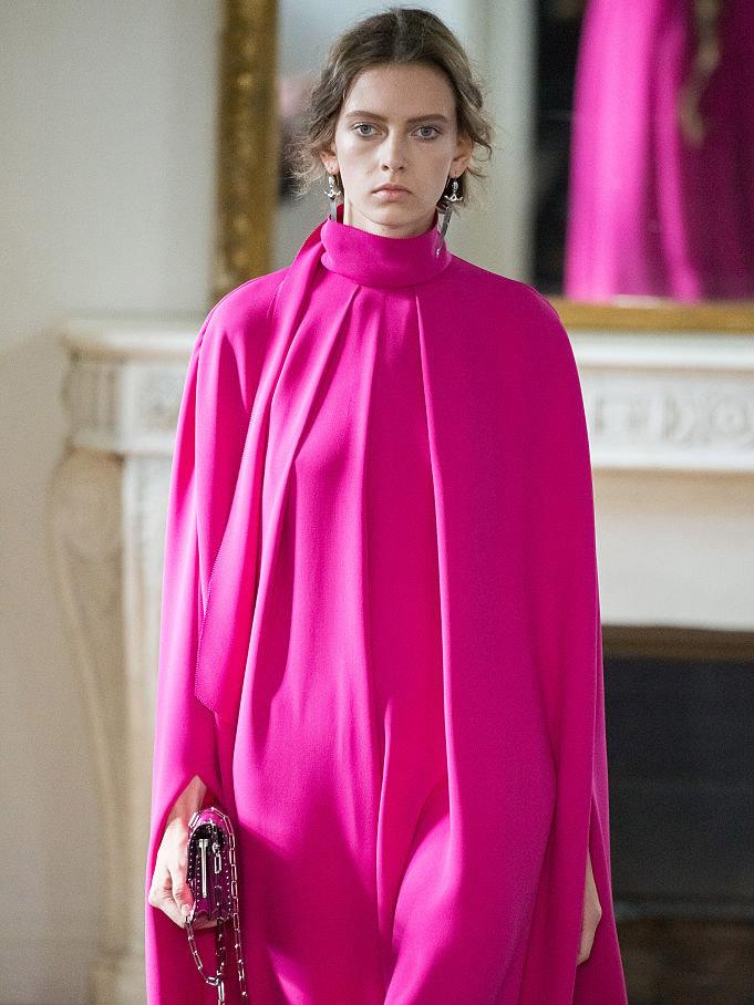 Valentino featured a watermelon pink cape-dress hybrid