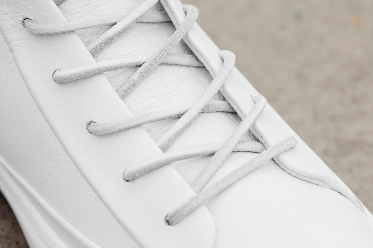 Even the traditional cloth laces have been ditched in favor of contemporary leather ones