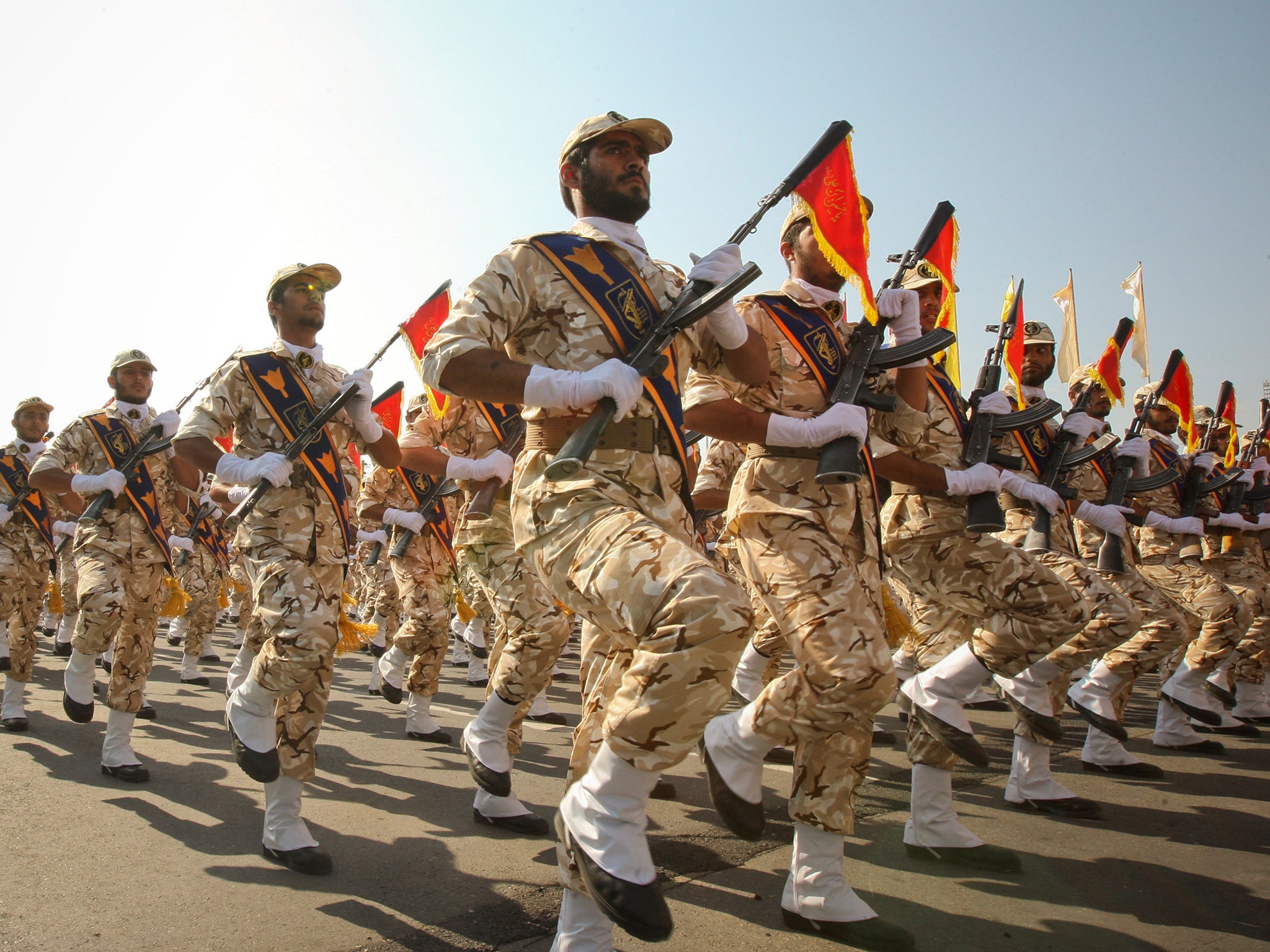 Members of the Iranian Revolutionary Guard march