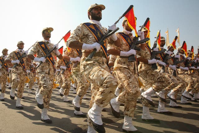 Members of the Iranian Revolutionary Guard march