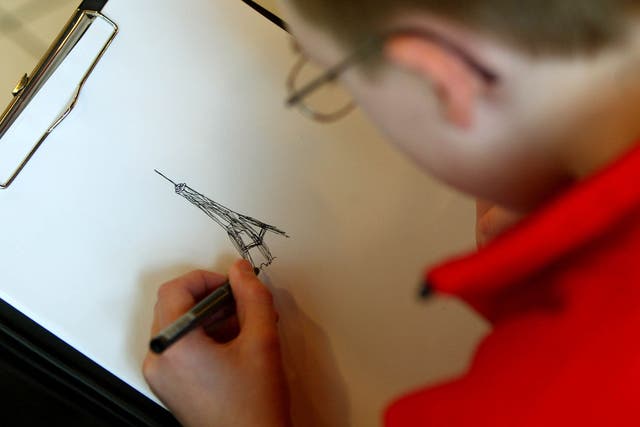 An 11-year-old boy with autism sketches the Eiffel tower