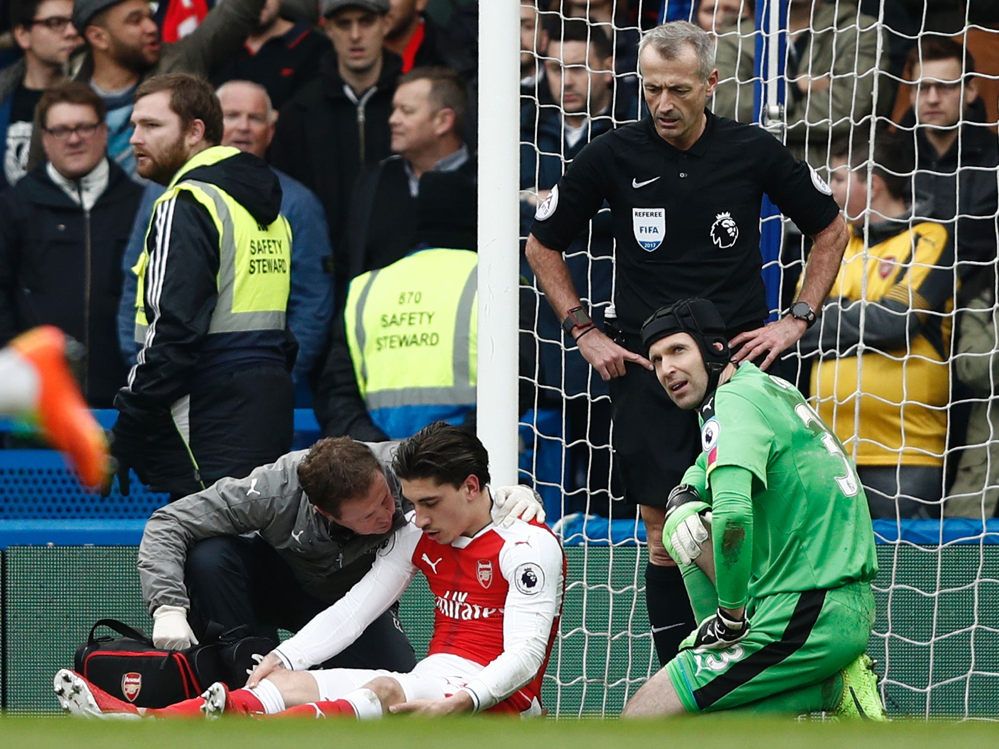 Hector Bellerin had to be substituted after taking a blow to the head against Chelsea