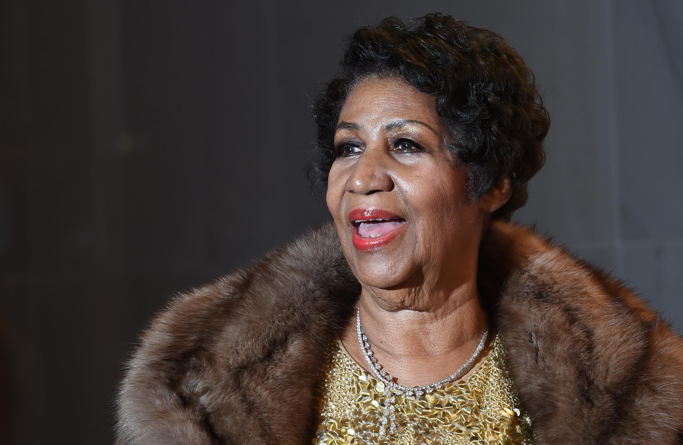 Aretha Franklin poses on the red carpet before the 38th Annual Kennedy Center Honors December 6, 2015 in Washington, DC